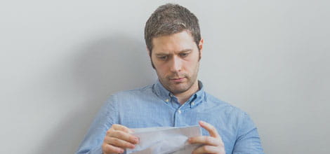 man perturbed opening letter